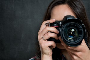 Closeup Of Woman With Camera